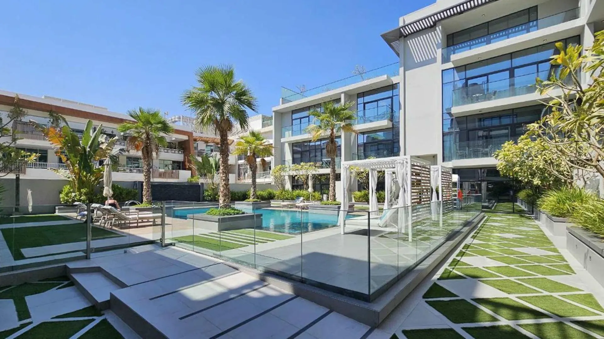 Modern Bali Vibes Studio With Pool And Palm Tree Views Jvc Dubai Apartment