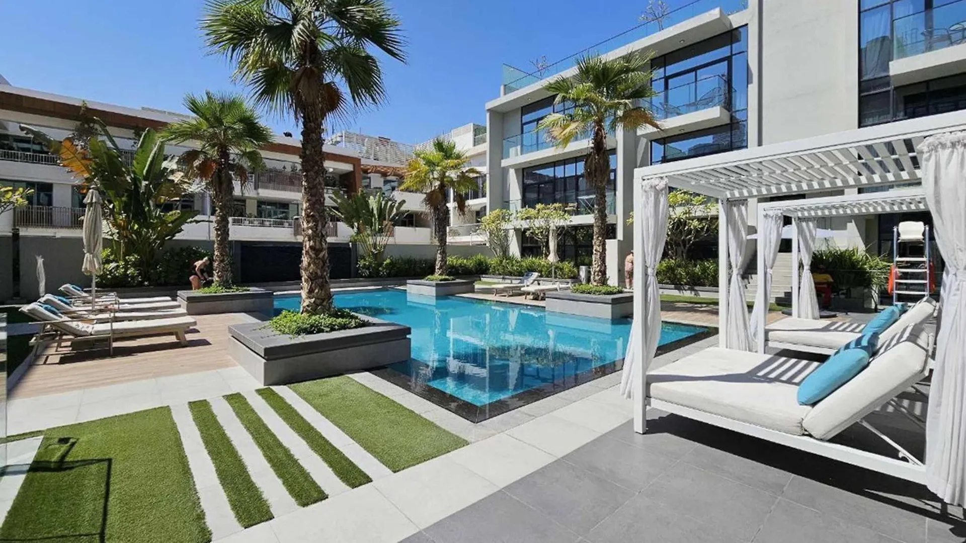 Modern Bali Vibes Studio With Pool And Palm Tree Views Jvc Dubai