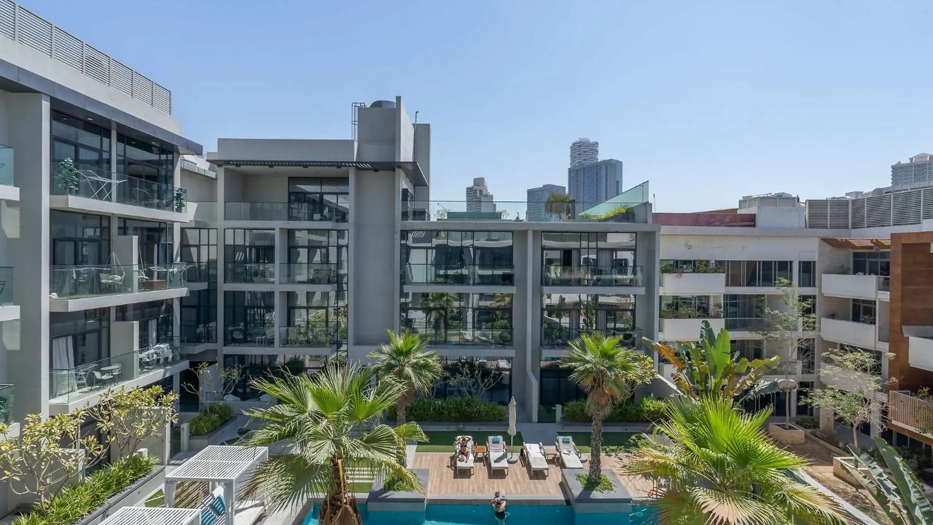 Modern Bali Vibes Studio With Pool And Palm Tree Views Jvc Dubai