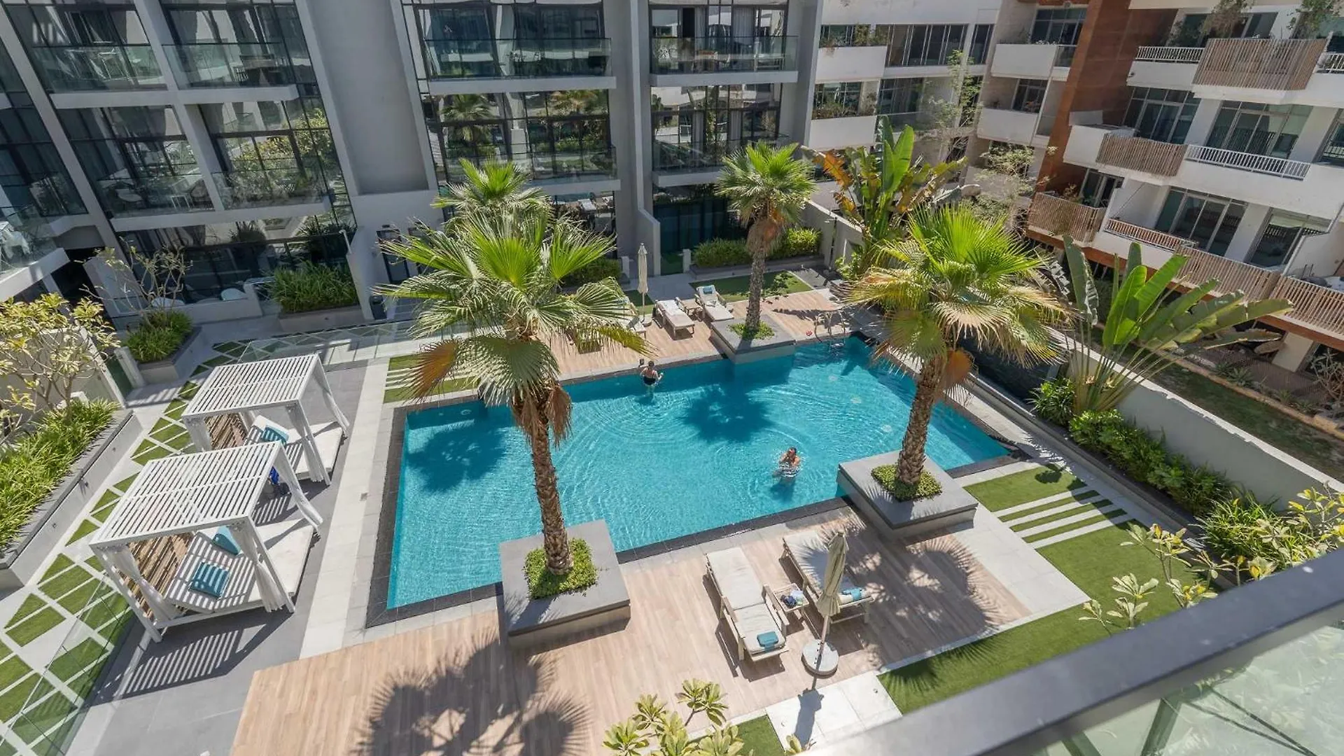 Modern Bali Vibes Studio With Pool And Palm Tree Views Jvc Dubai